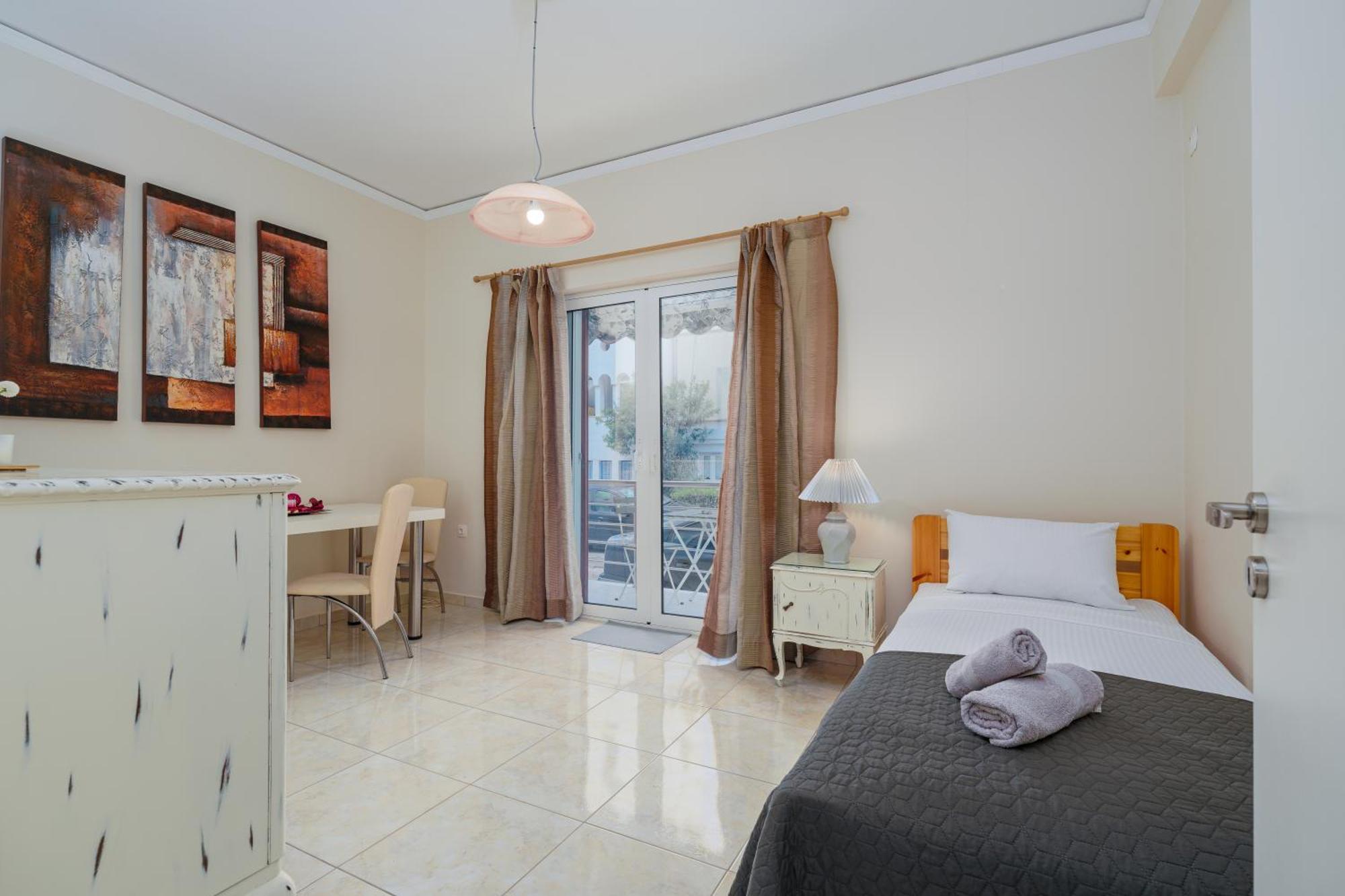 Nostos Apartment, With A Spacious Backyard Artemida  Bagian luar foto