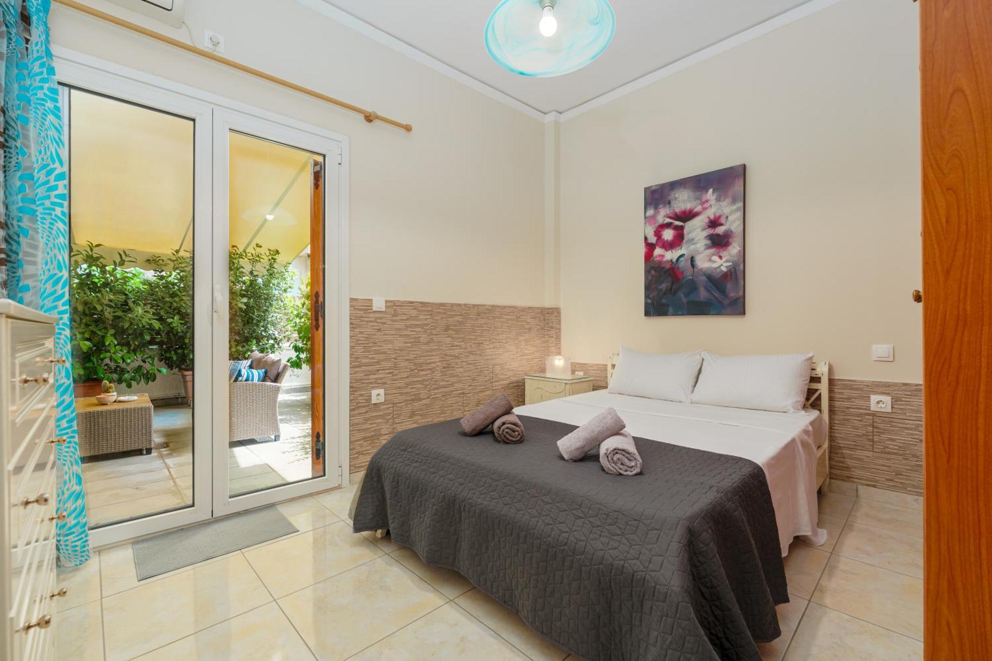 Nostos Apartment, With A Spacious Backyard Artemida  Bagian luar foto